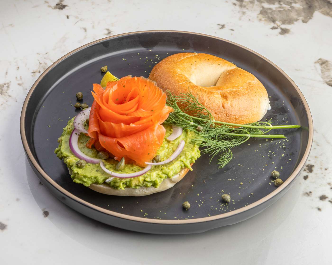 Smoked salmon bagel with a salmon rose