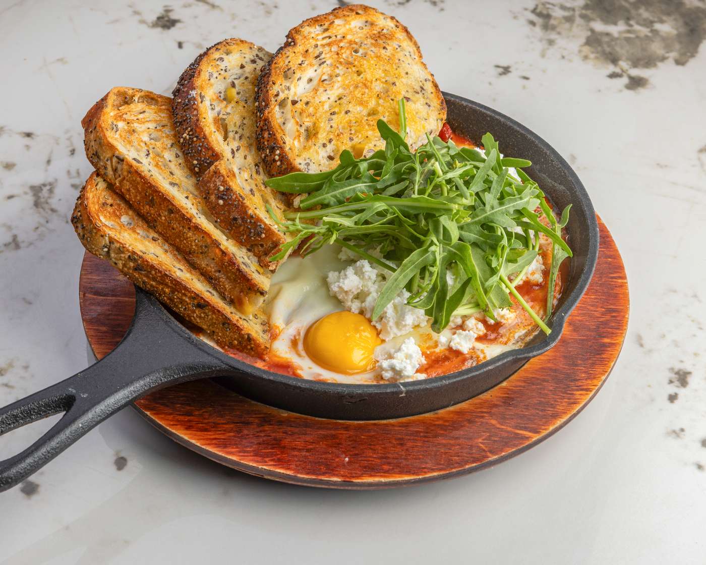 Shakshuka baking in a cast-iron skillet