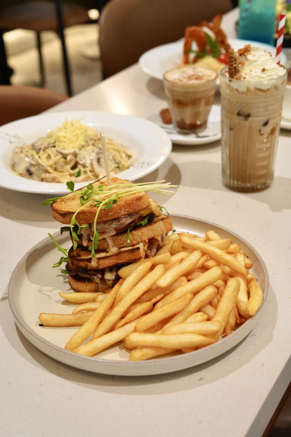 Club sandwich with fries